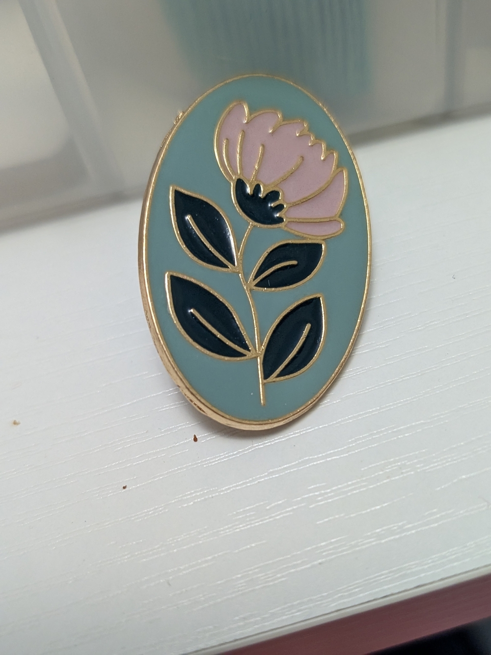 Floral Ename Needle Minder Pin - Pink Flower on Teal Background